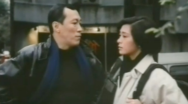 Philip Chan and Pat Ha in "Night Caller" (1985)