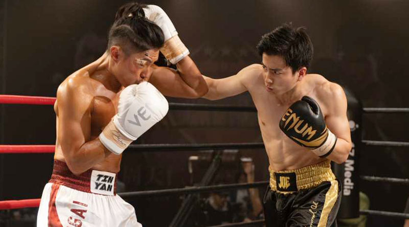 Endy Chow (left) in "One Second Champion" (2021)