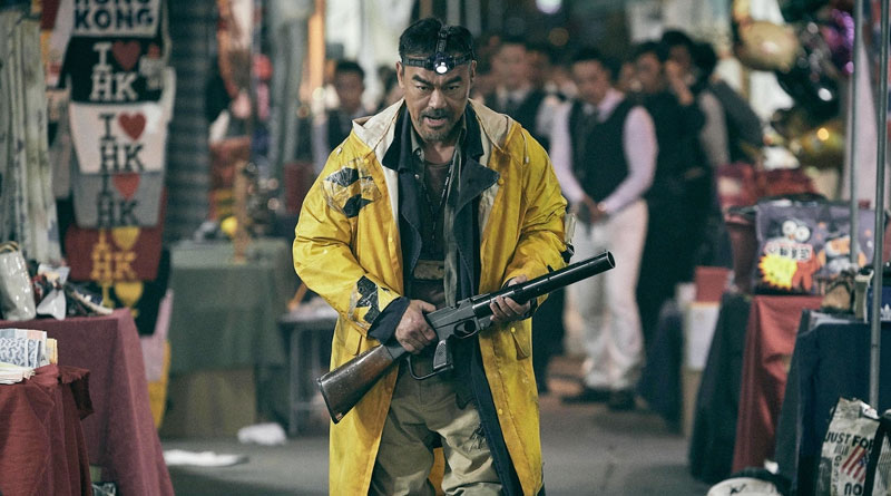 Lau Ching-Wan plays Jun Lee in "Detective vs. Sleuths" (2022)
