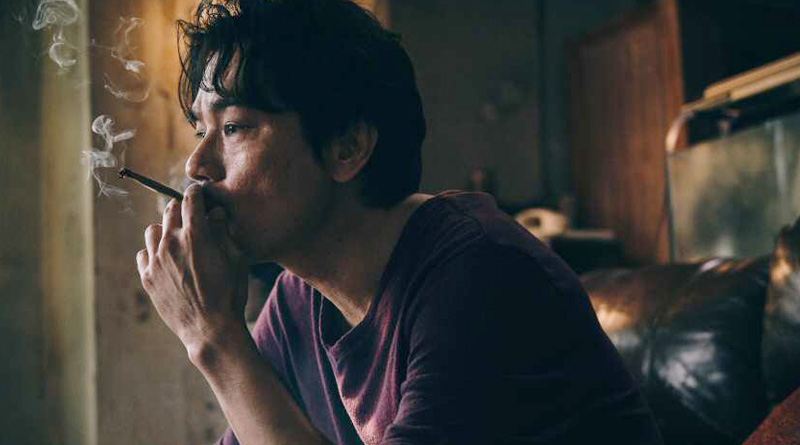 (Gordon) Lam Ka-Tung as Kwan Chiu in "Hand Rolled Cigarette" (2021)